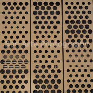 A geometric flat lay macro shot of a black gold perforated metal panel featuring a rhythmic repeating pattern of circular black cutouts for avant-garde music album cover photography by Bon Arte Photography.